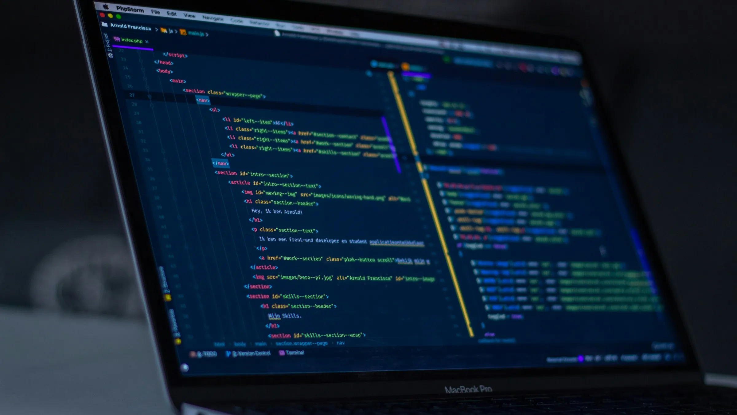 Developer's laptop with source code on screen (Unsplash)