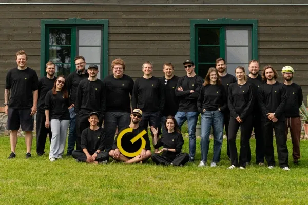 Order Group team photo outdoors in matching black branded t-shirts